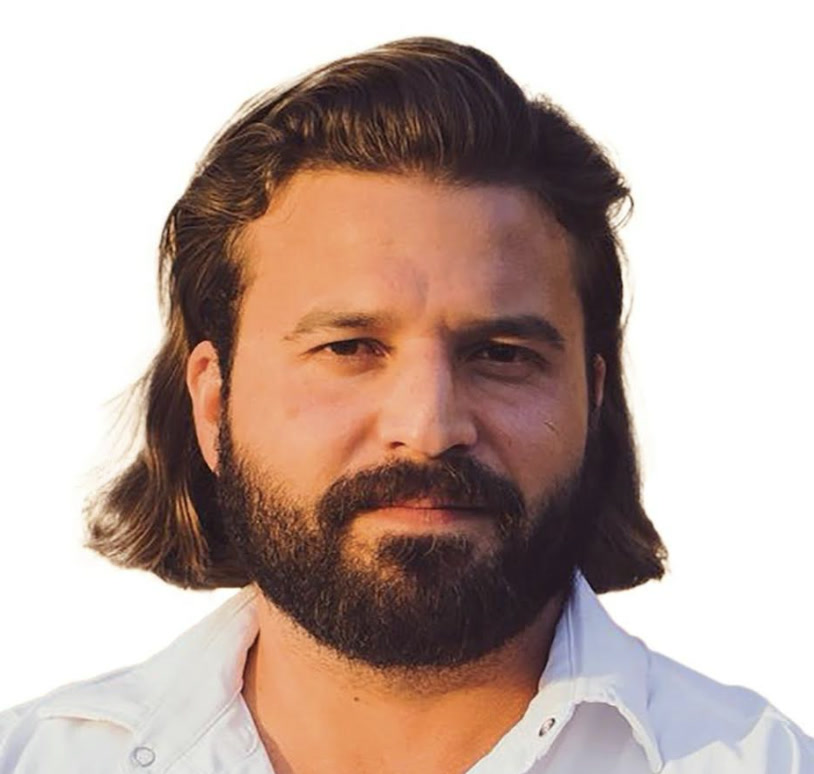 Front-facing close-up of Brandon showing his eyes, hairline and beard